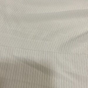 Cream colored blouse fabric